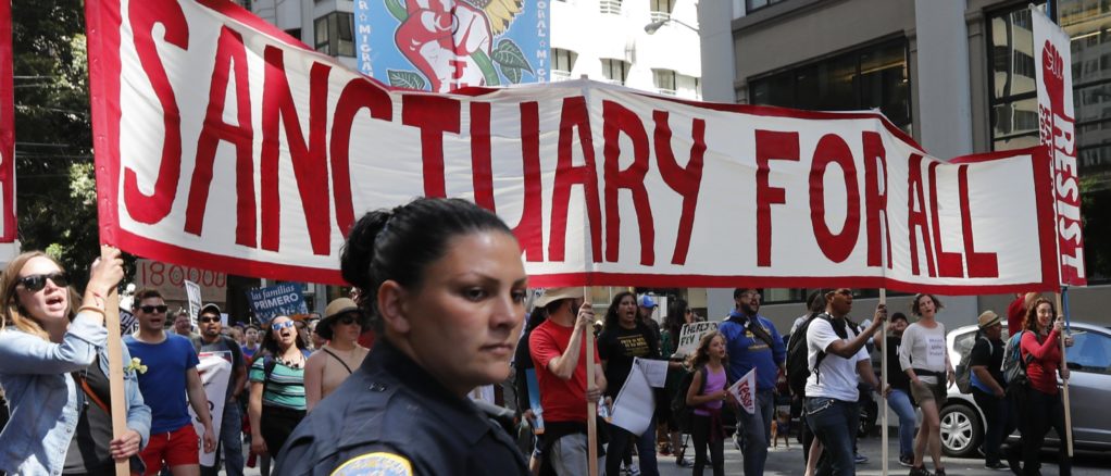 protesta marcha inmigrantes santuario