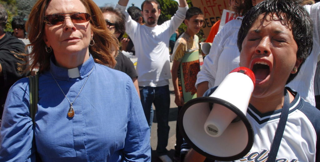 manifestantes protesta marcha inmigrantes