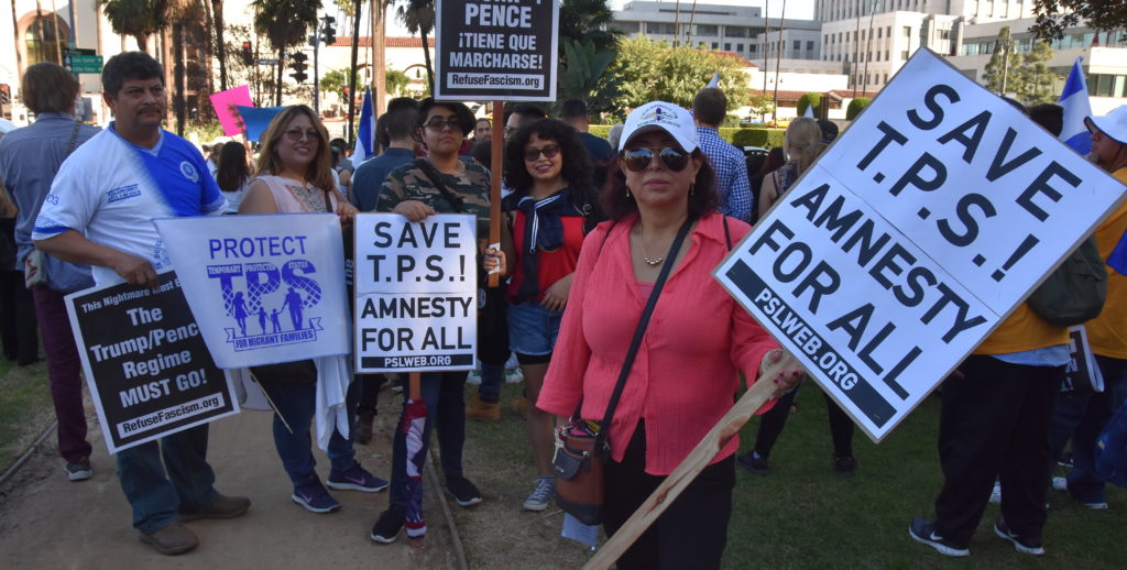 Activistas piden en marcha residencia permanente para beneficiados con TPS